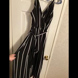 BLACK AND WHITE WALK THROUGH ROMPER WITH TIE WAIST